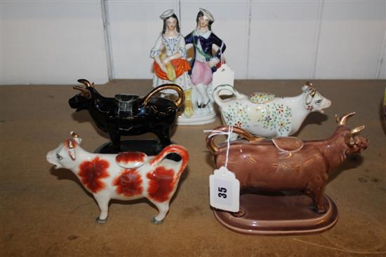 4 cow creamer & Staffs figure